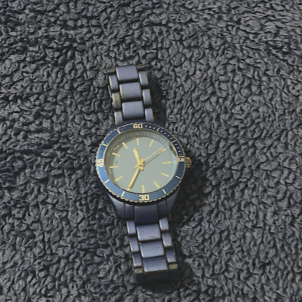 Men’s blue watch.
